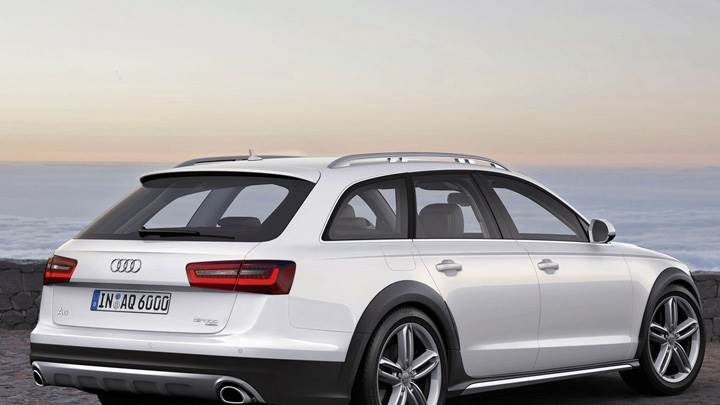 Back Side Pose Of 2013 Audi A6 Allroad In White Near Sea Side